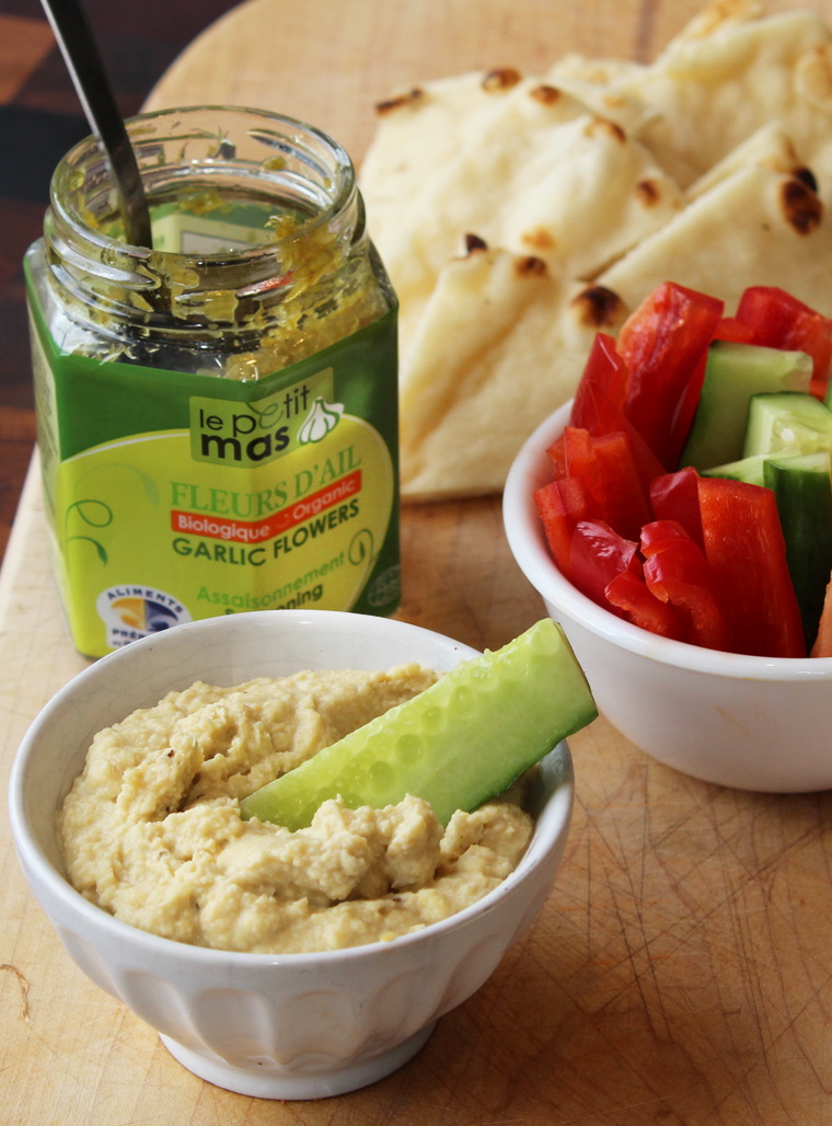 Recipe - Hummus with roasted garlic or garlic scapes Grilled herby potatoes with garlic scapes Garlic scapes in hamburgers or hot dogs Garlic scape whipped cream (for seafood) Garlic scape sour cream - Recipes with fermented garlic scapes – Le Petit Mas organic garlic and garlic scape farm in Quebec (Canada) 